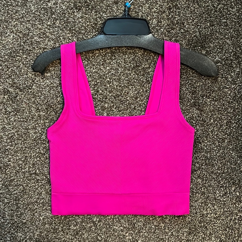 Bright pink cropped workout top